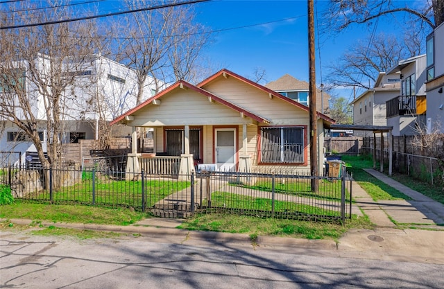 bungalow-style house with a front yard