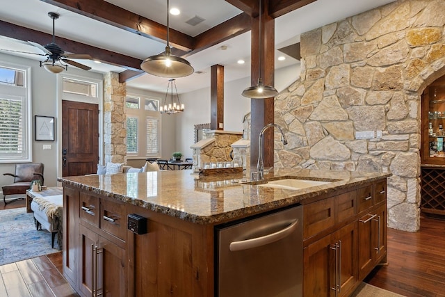 kitchen with a center island with sink, decorative light fixtures, dishwasher, and dark hardwood / wood-style flooring