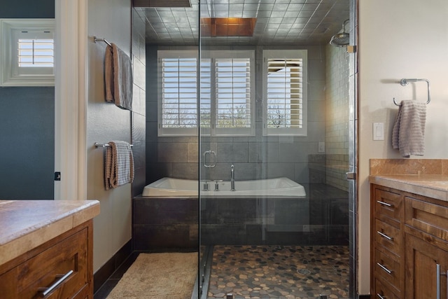 bathroom with tile floors and independent shower and bath