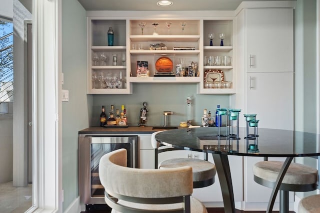 bar featuring beverage cooler