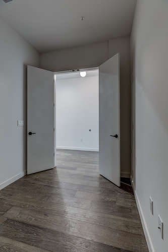 unfurnished room featuring wood-type flooring