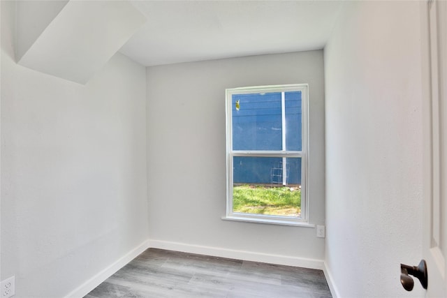 empty room with light hardwood / wood-style floors