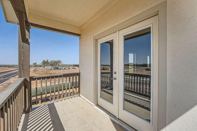 balcony featuring french doors