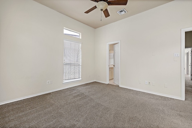 carpeted empty room with ceiling fan