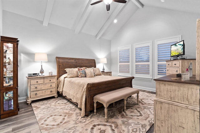 bedroom featuring beam ceiling, ceiling fan, dark hardwood / wood-style flooring, and high vaulted ceiling