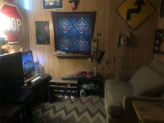 living room featuring wooden walls