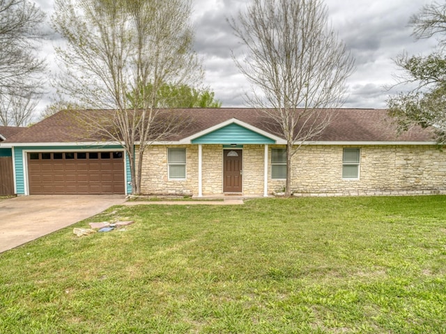 ranch-style home featuring a garage and a front yard