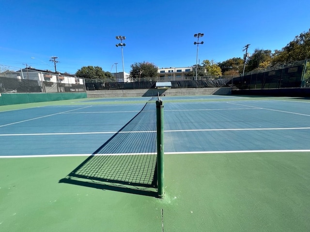 view of tennis court with basketball court