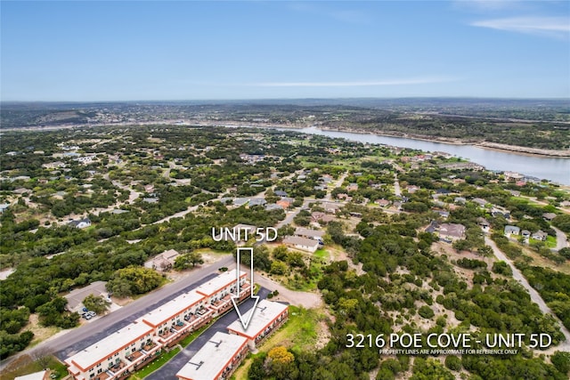 drone / aerial view with a water view