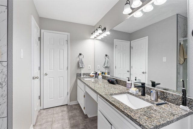 bathroom featuring tile flooring and dual vanity