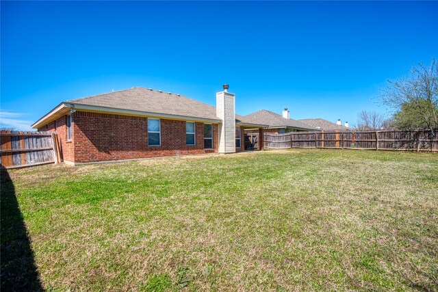 exterior space with a yard