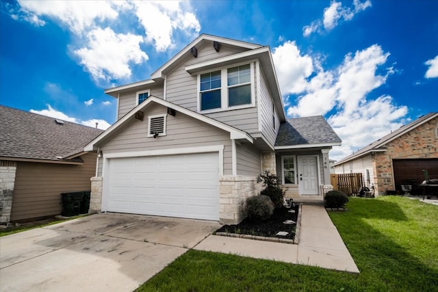 view of front of house with a front lawn and a garage