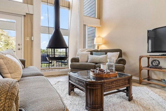 203 Venture Blvd S, Point Venture, TX 78645 - living area featuring a towering ceiling and plenty of natural light