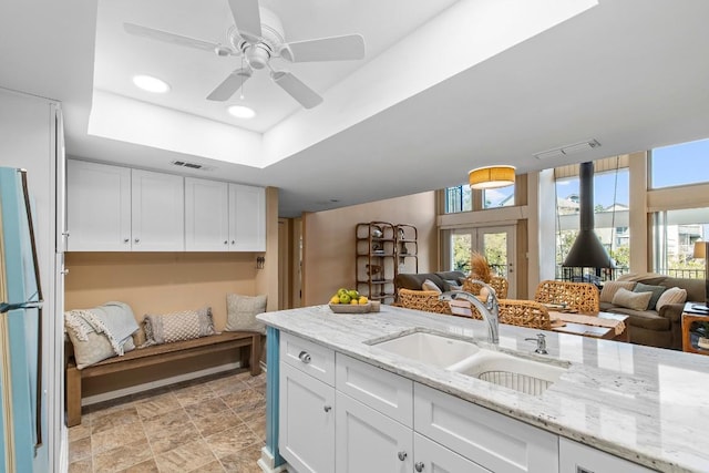 203 Venture Blvd S, Point Venture, TX 78645 - kitchen with a sink, open floor plan, plenty of natural light, and recessed lighting