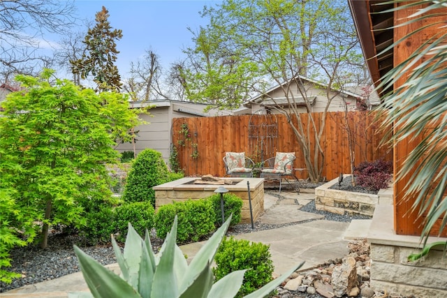 view of terrace featuring a fire pit