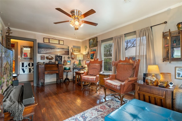 living area featuring dark hardwood / wood-style floors, ceiling fan, and ornamental molding