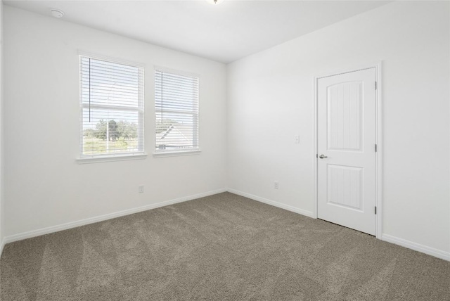 view of carpeted spare room