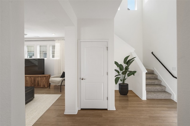 hallway featuring wood-type flooring