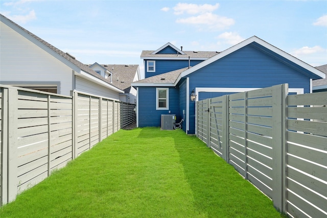 view of yard featuring central AC