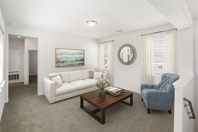 living room with light colored carpet