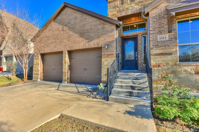 view of front of property featuring a garage