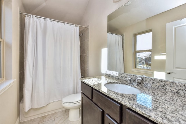 full bathroom with toilet, large vanity, tile floors, and shower / tub combo with curtain