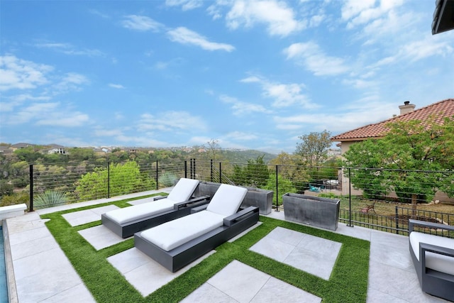 view of yard featuring an outdoor living space and a patio area