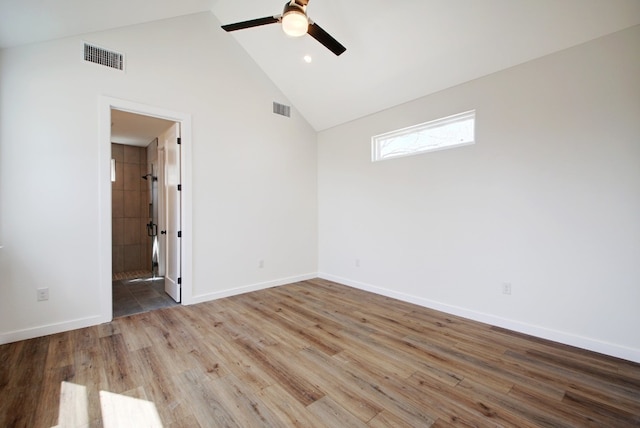 unfurnished room with high vaulted ceiling, ceiling fan, and hardwood / wood-style flooring