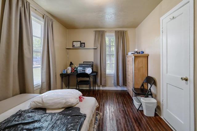 bedroom featuring dark hardwood / wood-style floors