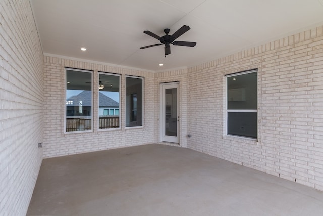 view of terrace featuring ceiling fan