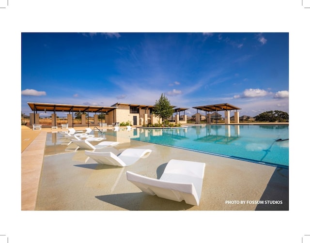 view of swimming pool featuring a gazebo