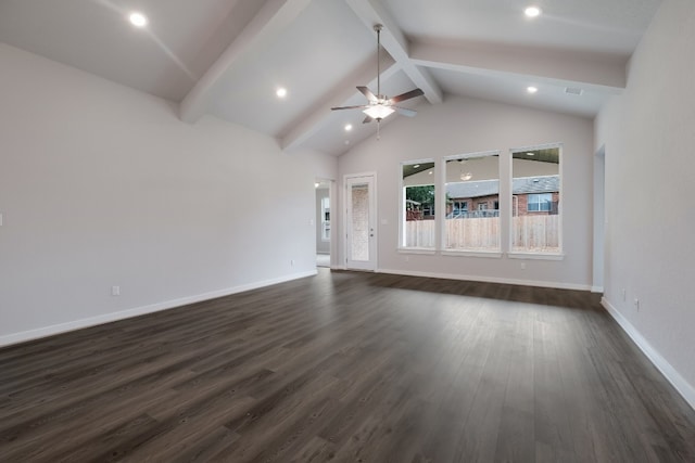 interior space with ceiling fan, dark hardwood / wood-style floors, and lofted ceiling with beams