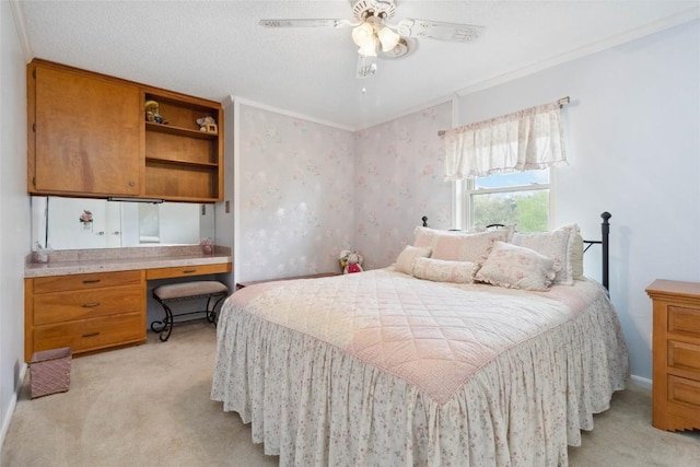 bedroom with ceiling fan and light carpet