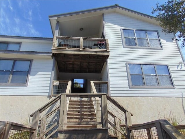 exterior space with a balcony