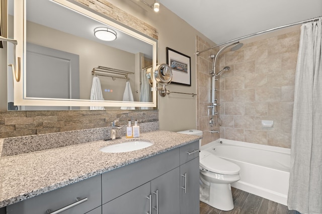 full bathroom featuring vanity, backsplash, shower / bath combo, and hardwood / wood-style flooring