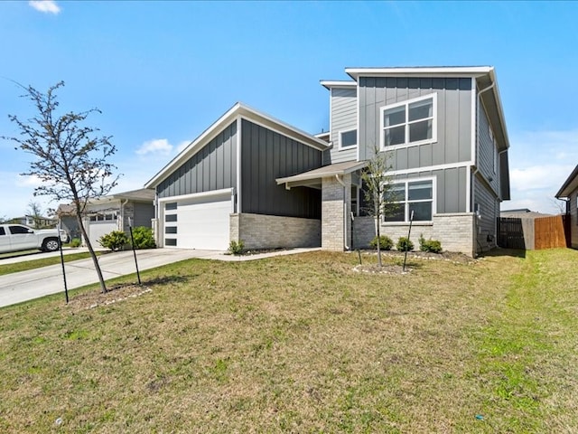 view of front facade featuring a front lawn and a garage