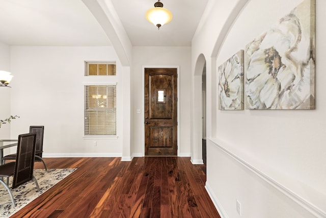 entrance foyer featuring dark wood-type flooring