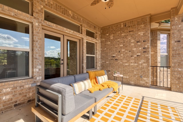 view of patio with outdoor lounge area and ceiling fan