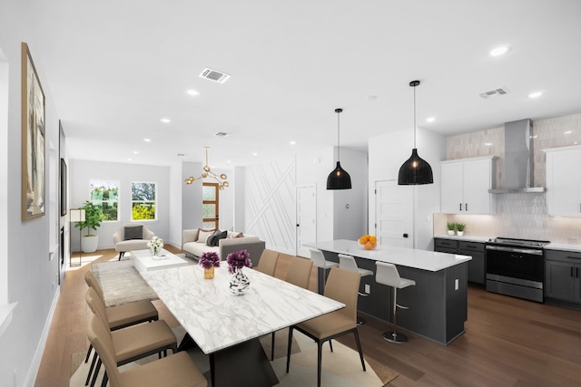 dining area with hardwood / wood-style flooring