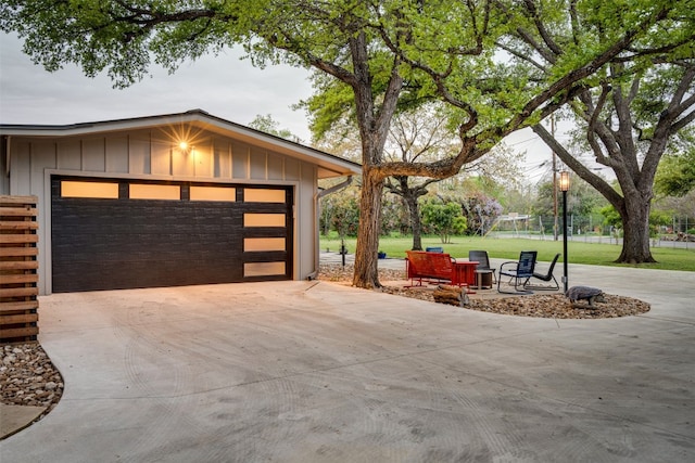 garage featuring a yard