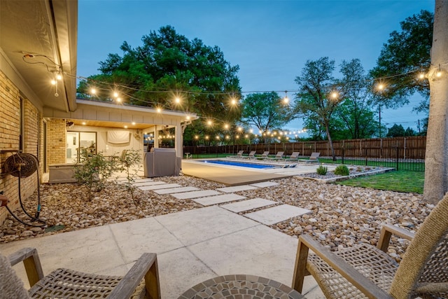 view of terrace featuring a fenced in pool