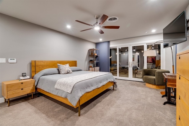 bedroom with french doors, light carpet, access to outside, and ceiling fan