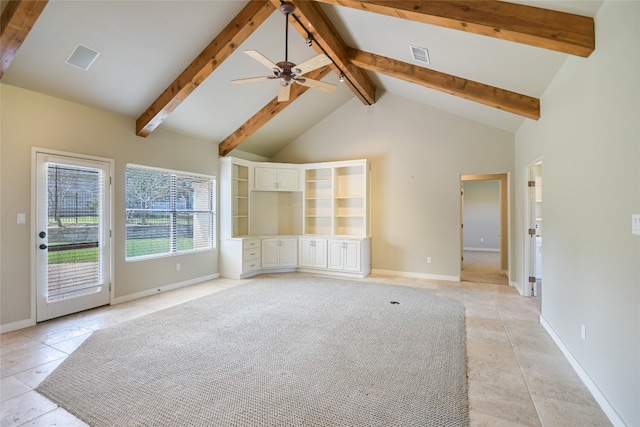 unfurnished living room featuring beamed ceiling, high vaulted ceiling, and ceiling fan