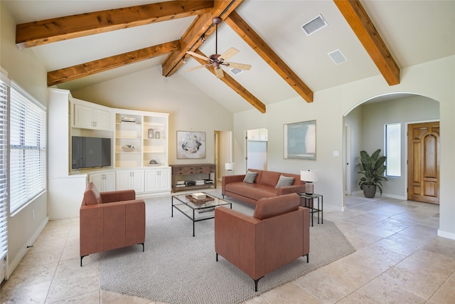 living room featuring beamed ceiling, high vaulted ceiling, and ceiling fan