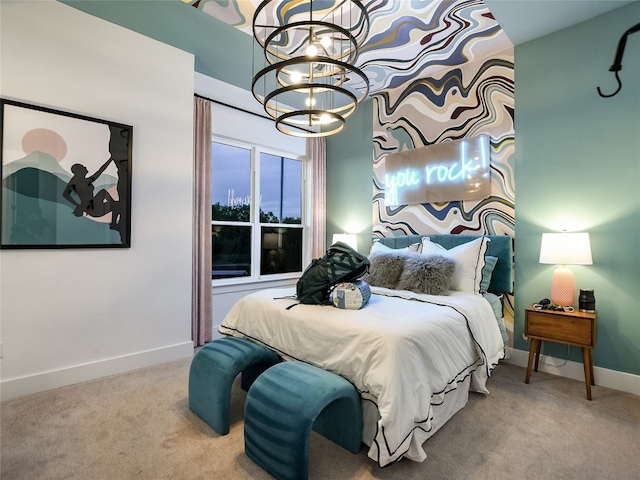 carpeted bedroom featuring a chandelier