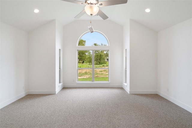 unfurnished room featuring light carpet, ceiling fan, and lofted ceiling