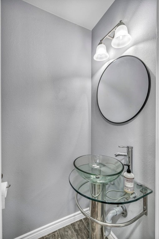 bathroom featuring hardwood / wood-style flooring