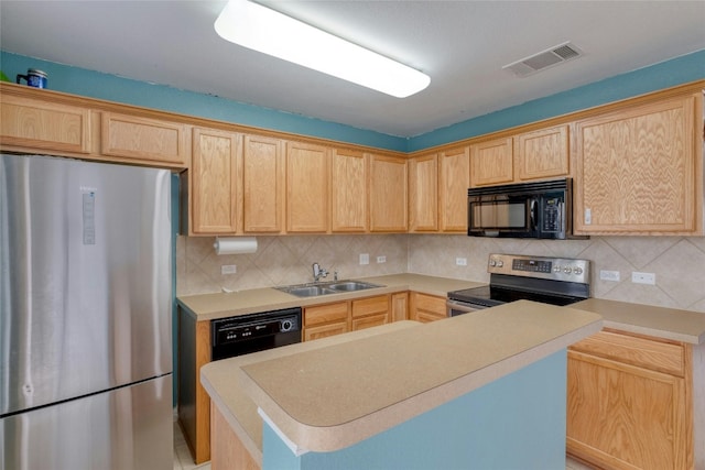 kitchen with sink, black appliances, light brown cabinetry, and tasteful backsplash