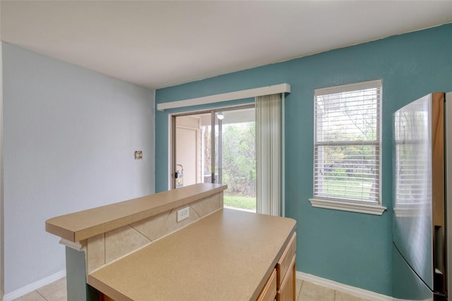 view of tiled dining space