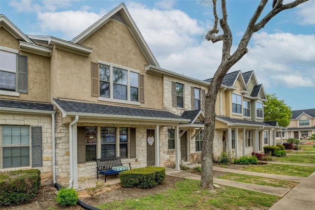 view of property with covered porch